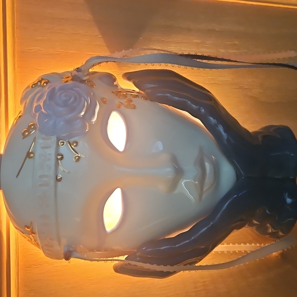 Elegant Ceramic Mask with Floral Design